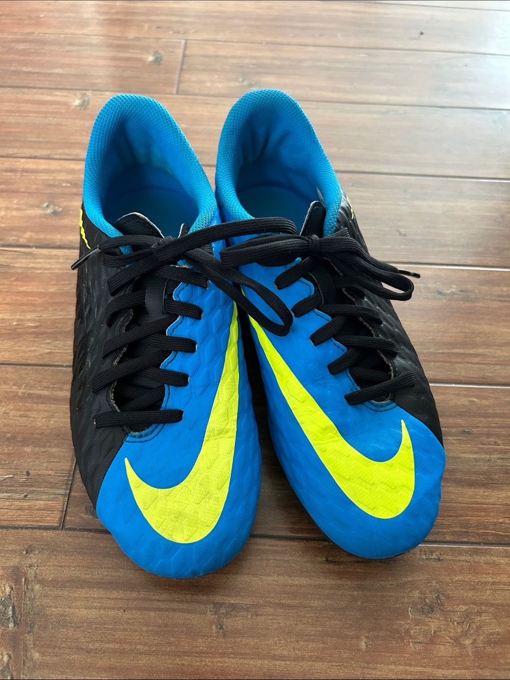 Nike boys Blue & Black Soccer Cleats with Yellow Swoosh